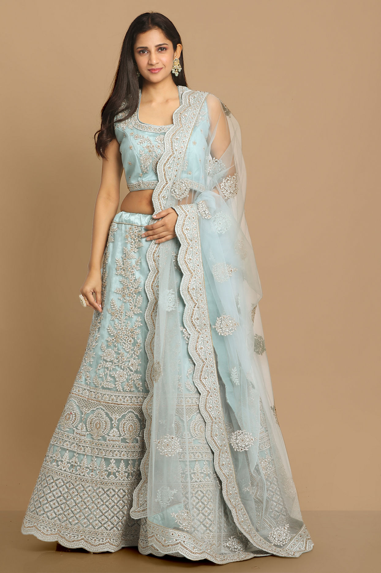 alt message - Mohey Women Graceful Light Blue Lehenga image number 0